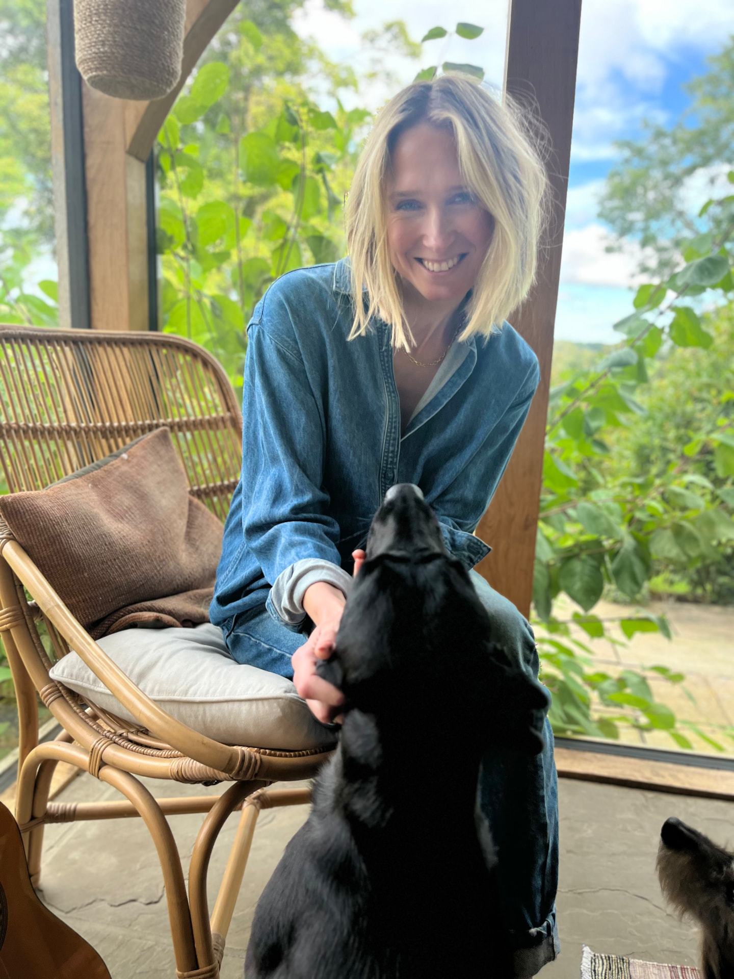 Rachel Fortune, founder of Midlife Answers, at home with her dog